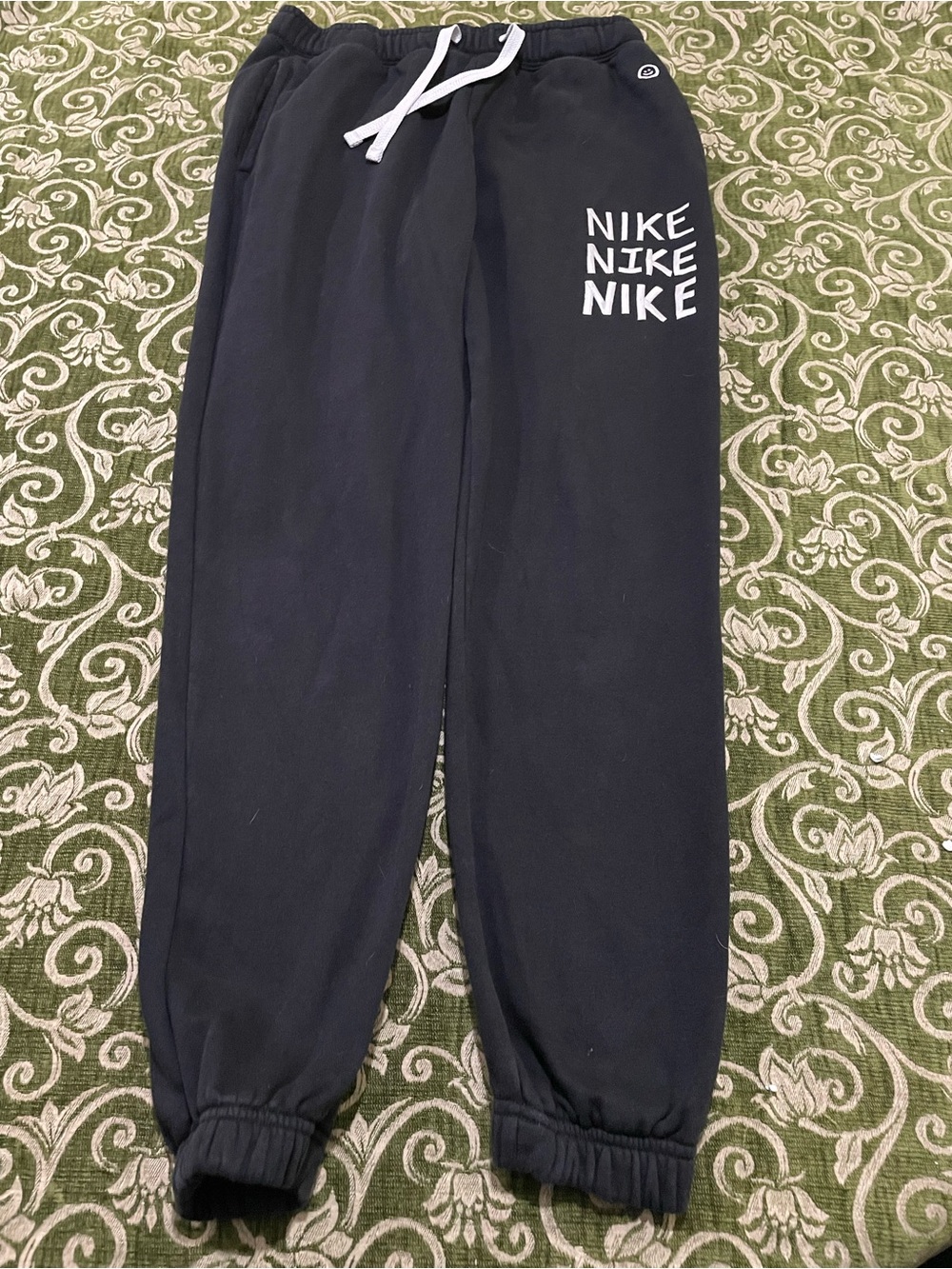 Nike Black Jogger Sweatpants with White Drawstring and Logo